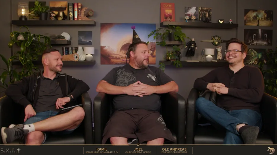 Dune: Awakening developer stream with three team members on camera