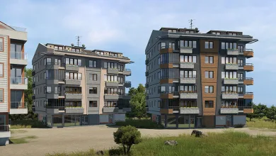 Several modern apartment buildings shown among grassy terrain in a Soul of Anatolia preview for Euro Truck Simulator 2
