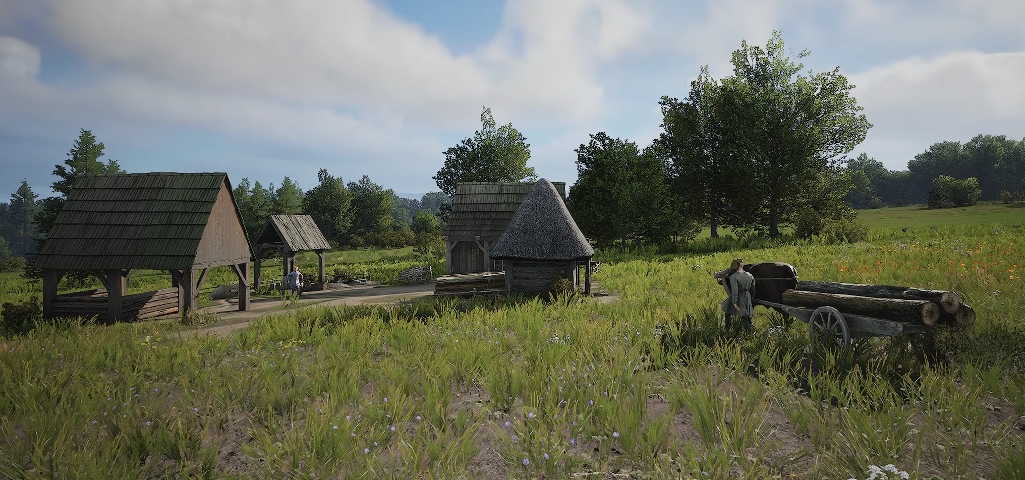 Construction yard with handcarts and ox carts in Manor Lords