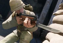 Enlisted soldier aiming a bayonet-equipped weapon