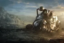 A Fallout 76 power armor helmet rests in a wasteland landscape beneath a cloudy sky