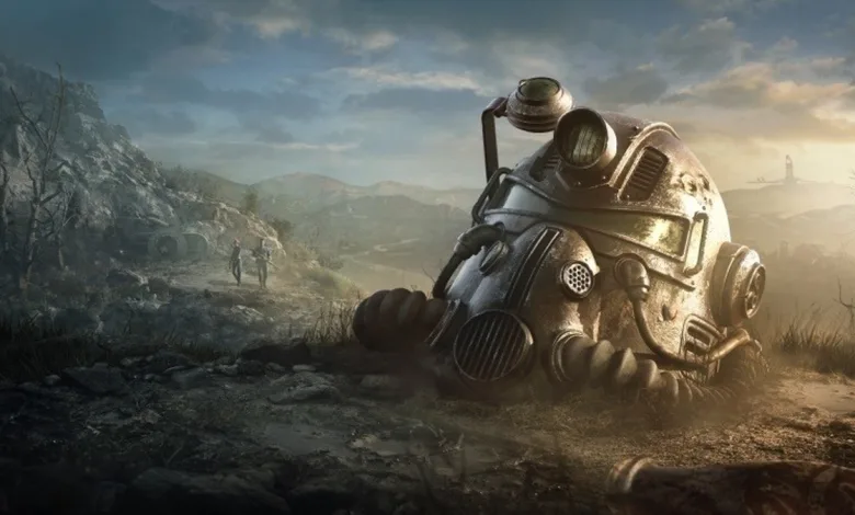 A Fallout 76 power armor helmet rests in a wasteland landscape beneath a cloudy sky