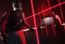 Masked GTA Online characters move through a room filled with red laser tripwires.