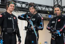 Three performers in motion-capture suits on the set of Mafia: The Old Country