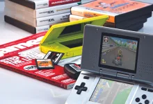 Nintendo DS consoles, games, and accessories arranged on a table