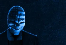 A blue-lit masked PAYDAY 2 heister in a suit
