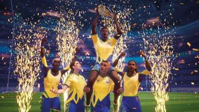 Rematch players in yellow and blue kits lift a trophy as fireworks erupt in a stadium