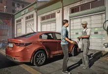 A driver speaks with a mechanic beside a red sedan outside an auto repair shop in Rideshare "Stimulator".