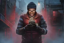 Silent Hill: Townfall protagonist checks a handheld device in a foggy town