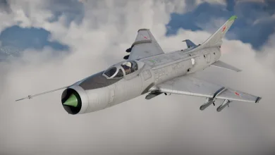 A Soviet Su-7-style fighter-bomber flies through clouds with missiles mounted beneath its wings.