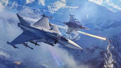 Two fighter jets fly over snowy mountains as one launches a missile