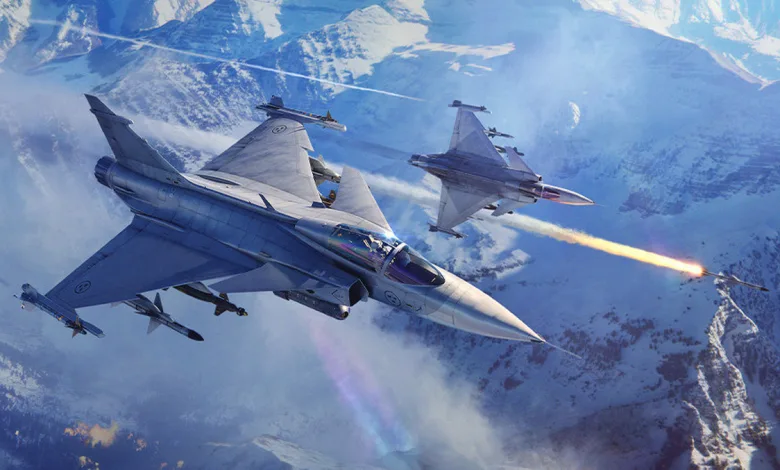 Two fighter jets fly over snowy mountains as one launches a missile