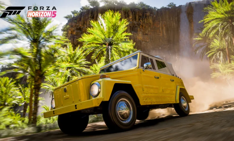 Yellow 1973 Volkswagen Thing driving through a dusty canyon in Forza Horizon 5