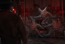 A hat-wearing detective faces a grotesque tentacled creature in a dim industrial room in The Sinking City 2.