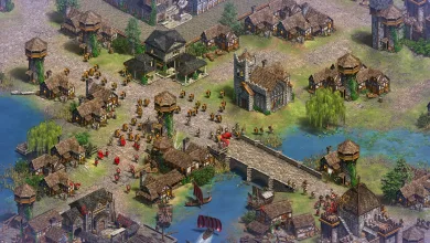 Age of Empires II gameplay showing a medieval settlement with defensive towers, infantry, a bridge, and ships on the water
