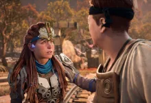 Aloy speaks with a man in a wooded Horizon game setting