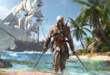 Edward Kenway stands on a Caribbean beach with a sailing ship behind him in Assassin's Creed Black Flag Resynced.