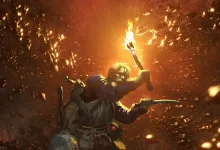 Dark and Darker adventurers explore a torchlit dungeon while one character raises a flaming torch
