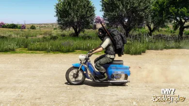 A DayZ Badlands survivor rides a blue motorcycle across a dusty road, leaving a cloud of dust behind.