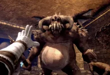 First-person view of a large horned demon inside a stone chamber in a Demon's Souls prototype scene
