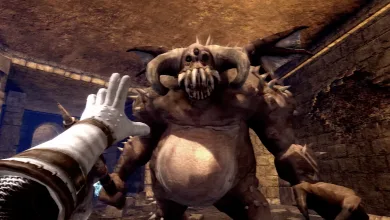 First-person view of a large horned demon inside a stone chamber in a Demon's Souls prototype scene