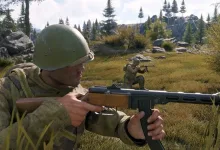 An Enlisted soldier aims a rifle in a forest battlefield while another soldier takes cover behind him