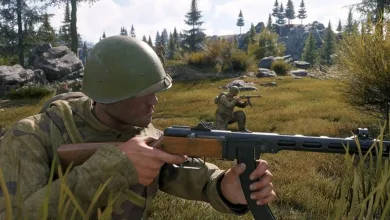 An Enlisted soldier aims a rifle in a forest battlefield while another soldier takes cover behind him