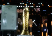 The Esports World Cup Club Championship trophy displayed on a stage.
