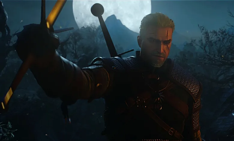 Geralt raises his sword under a full moon in a dark forest.