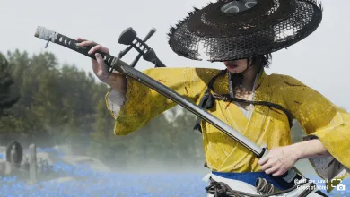 A katana-wielding character in a yellow outfit and straw hat stands in a misty landscape in Ghost of Yōtei.
