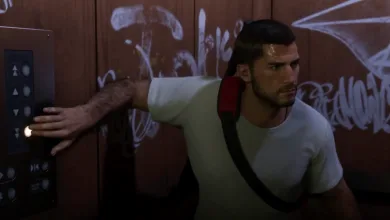 A Grand Theft Auto VI character reaches toward an elevator panel in a graffiti-covered elevator.