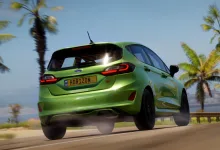 A green hatchback drives along a palm-lined coastal road in Forza Horizon 5