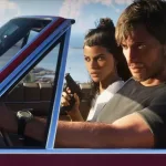 A man drives a convertible with a woman beside him in Grand Theft Auto VI.