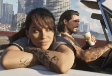 Lucia leans on the door of a convertible while Jason drives through a city in Grand Theft Auto VI.