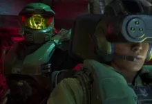 Two armored soldiers inside a dimly lit vehicle in Halo: Campaign Evolved