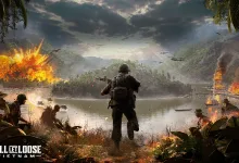 A soldier stands beside a river as explosions and aircraft fill the battlefield in Hell Let Loose: Vietnam.