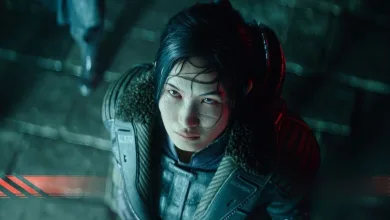 A woman in futuristic armor looks toward the camera in a dark cyberpunk environment.