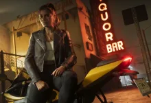 Lucia sits on a yellow motorcycle outside the Quor Bar at night in Grand Theft Auto VI