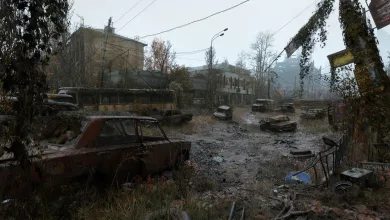 A rain-soaked ruined street filled with abandoned cars, overgrown debris, and damaged buildings in METRO 2039.