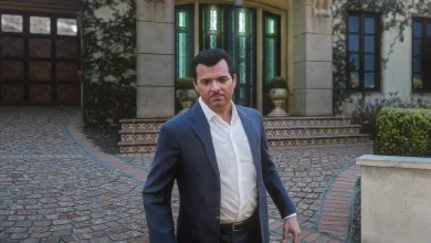Michael from Grand Theft Auto V standing outside a house