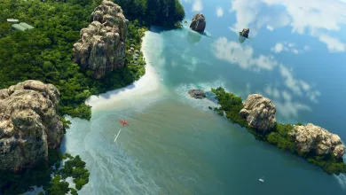 Aircraft flying over a tropical river surrounded by rocky, forested islands in Microsoft Flight Simulator 2024
