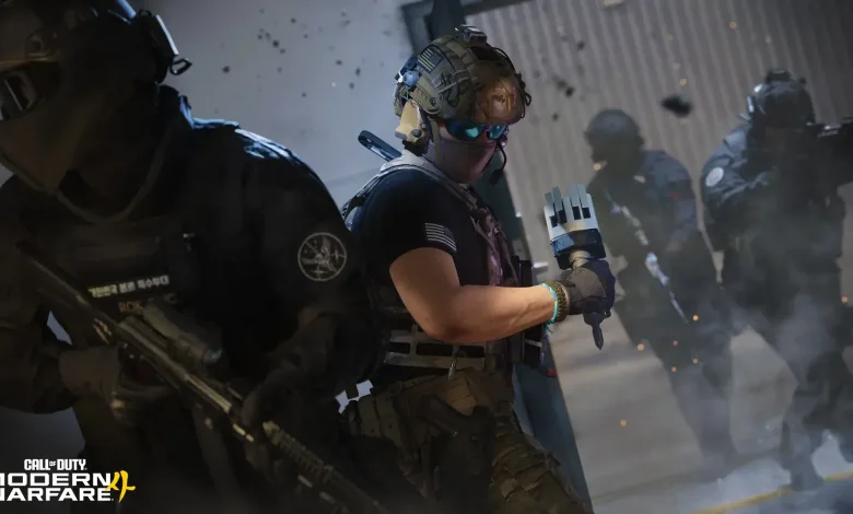 Modern Warfare 4 operators move through a smoky combat area during multiplayer gameplay