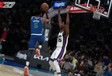 NBA 2K27 gameplay scene showing a player driving toward the basket as a defender contests the shot