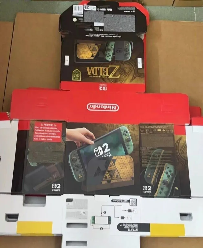 Opened Zelda-themed Nintendo Switch 2 packaging showing console and controller artwork
