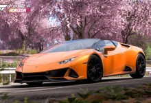 Orange Lamborghini Huracán driving beneath cherry blossoms in Forza Horizon 6