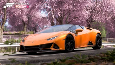 Orange Lamborghini Huracán driving beneath cherry blossoms in Forza Horizon 6