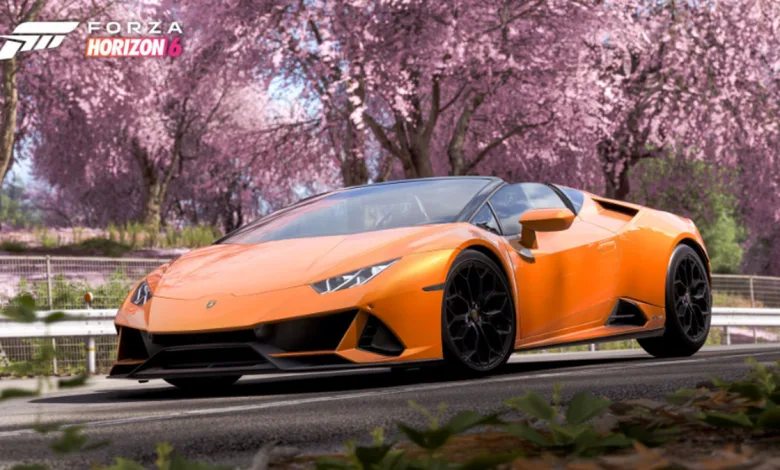 Orange Lamborghini Huracán driving beneath cherry blossoms in Forza Horizon 6