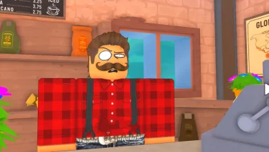 A Roblox cafe worker stands behind the counter in Own a Cafe.