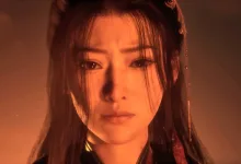 A woman from Phantom Blade Zero illuminated by warm orange light