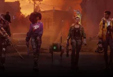 Four Redfall characters walking through a damaged city street with weapons and a small robot